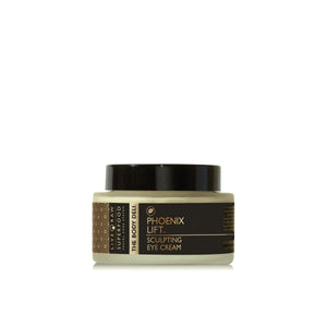 Jar of THE BODY DELI Phoenix Lift Sculpting Eye Cream with plant-based anti-aging ingredients for firming and hydrating the eye area.