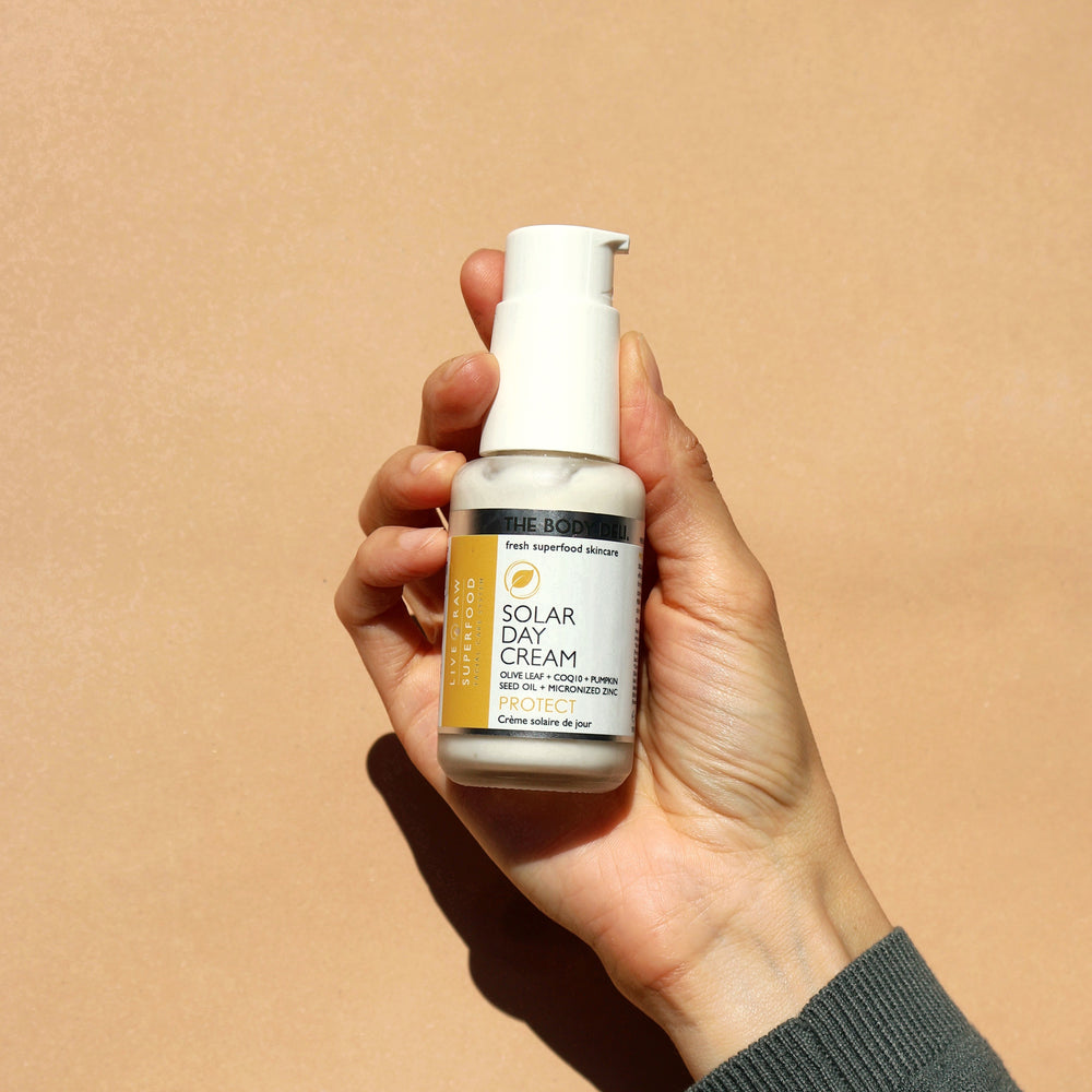 THE BODY DELI Solar Day Cream tube with natural mineral zinc and antioxidant-rich superfoods for skin protection and hydration.