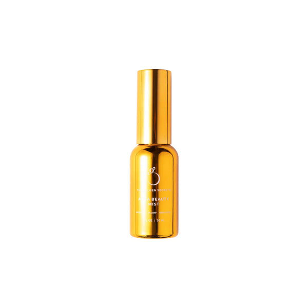 The Golden Secrets Aura Beauty Mist, a hydrating, plumping, and brightening facial mist that boosts skin radiance and soothes the senses. Formulated with key ingredients like tremella mushroom, red algae arctic peptide, and neroli orange blossom, it nourishes and protects the skin while enhancing hydration and balance. 30 ml