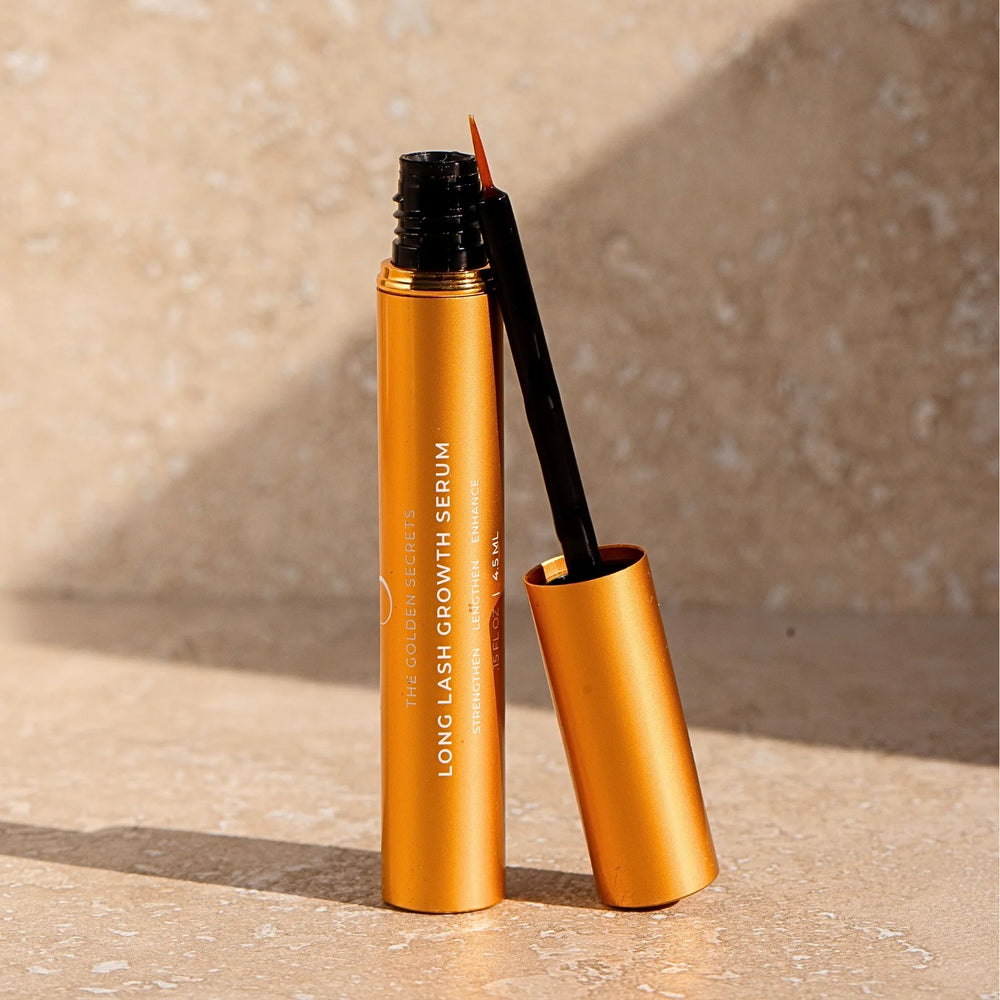 The Golden Secrets Long Lash Growth Serum, designed to enhance and nourish lashes for a fuller, thicker, and stronger appearance. With key ingredients like Biotinoyl Tripeptide-1 and Capixil™, this clean, non-toxic serum promotes natural lash health, offering visible results in as little as eight weeks. Ideal for a more confident, natural lash look without extensions or makeup. Free from prostaglandins and formulated for safe, long-lasting results.