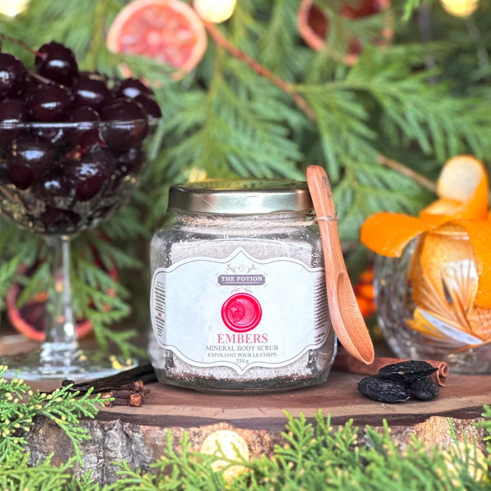 The Potion Cosmetics Embers Mineral Body Scrub with cinnamon sticks and cherries