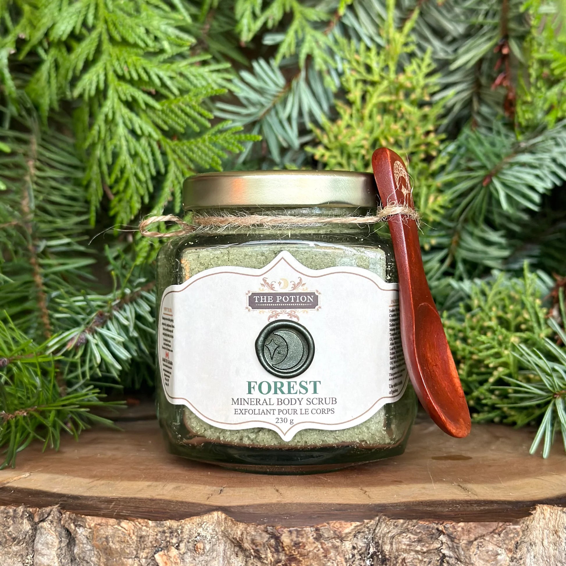 The Potion Cosmetics Forest Mineral Body Scrub with cedar branches and fir needles