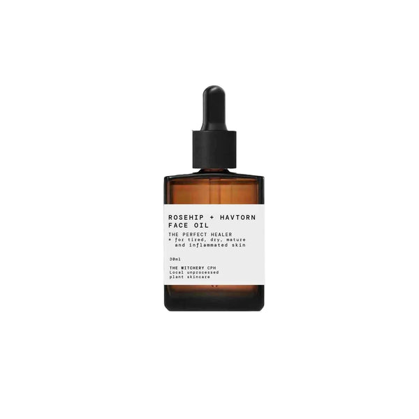 Rosehip Havtorn face oil bottle with dropper on a white background