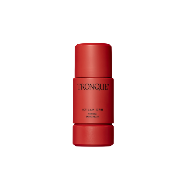 Red deodorant stick with 'Tronque' branding on a white background. TRONQUE Natural Deodorant