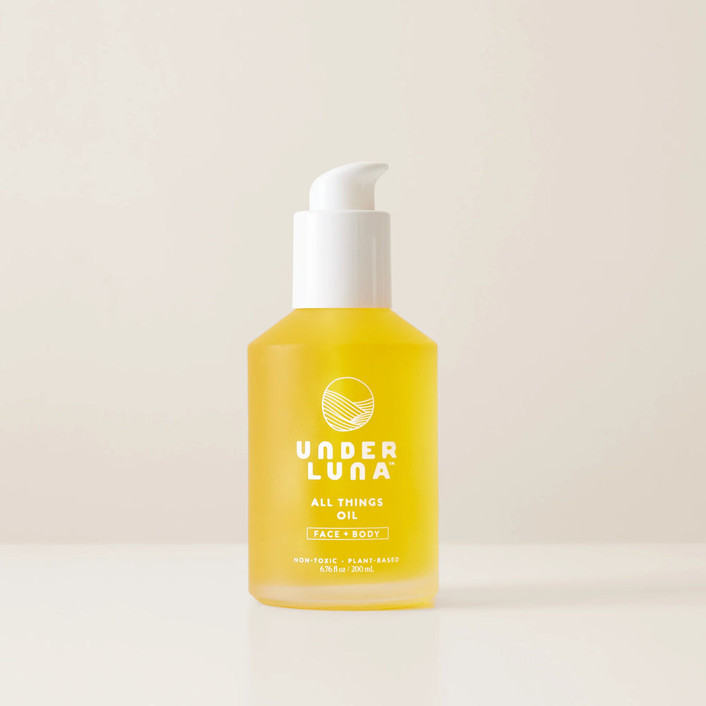 Under Luna All Things Oil in glass pump bottle for face and body care