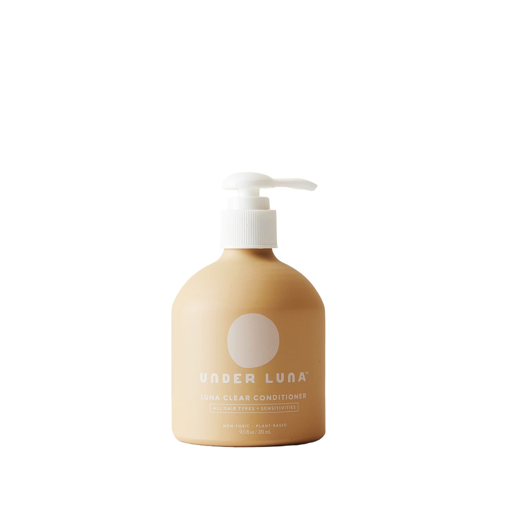 Under Luna Luna Clear Conditioner in recyclable aluminum bottle, essential oil-free, with rosemary, plantain, stinging nettle, calendula, and jojoba for hydration and scalp comfort.
