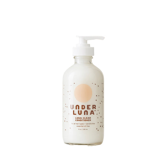 UNDER LUNA Luna Clear Conditioner, essential oil-free formula for all hair types. Hydrates and detangles with plant-based ingredients like rosemary, plantain leaf, and jojoba oil.