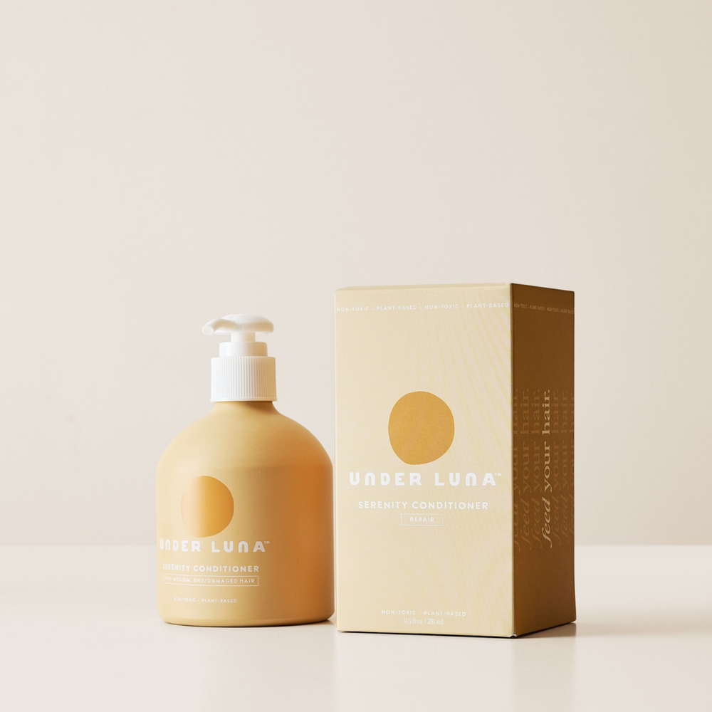Under Luna Serenity Conditioner in recyclable aluminum bottle, nourishing formula with sandalwood, cabreuva, calendula, and geranium for dry or damaged hair