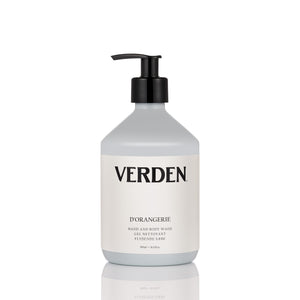 A bottle of Verden D'Orangerie hand and body wash with a black pump dispenser and a white label, set against a clean white background with a subtle reflection below.