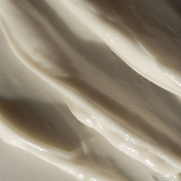 Close-up of smooth, white cream texture of VINTAGE NOON Vacation Skin Overnight Mask and Moisturizer.