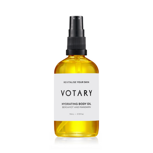 VOTARY Bergamot and Mandarin Hydrating Body Oil in glass bottle with citrus botanical oils