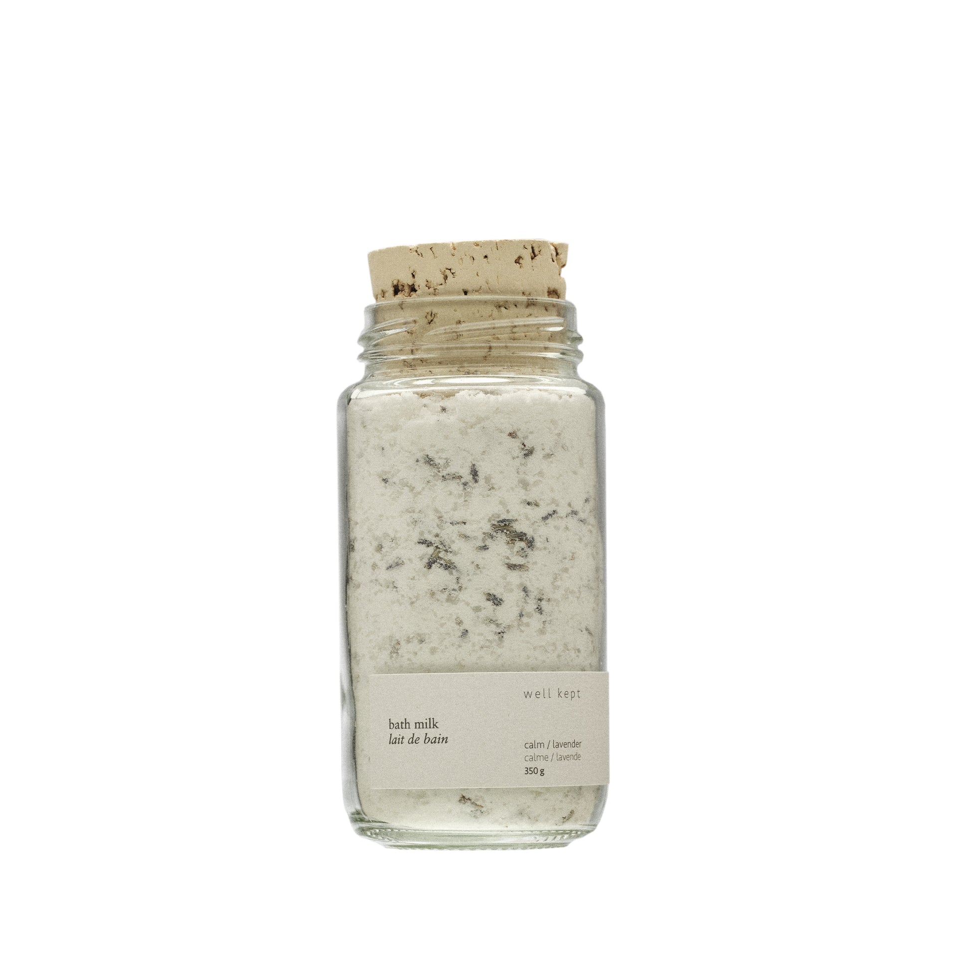 Well Kept Bloom Bath Milk (formerly Calm Bath Milk) in a glass bottle, showcasing a nourishing blend of coconut milk and Epsom salts with lavender essential oil for a calming bath experience.