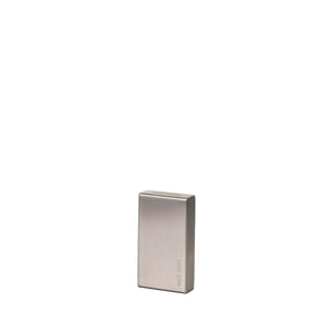 Well Kept Blade Bank, a compact stainless steel container for safe storage and recycling of used razor blades.