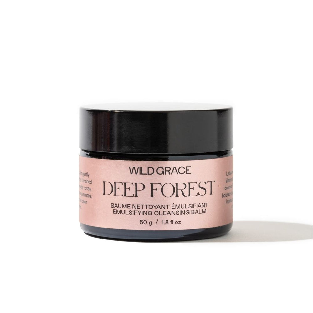 Wild Grace Deep Forest Emulsifying Cleansing Balm in a black jar with a dusty pink label, set against a plain white background.