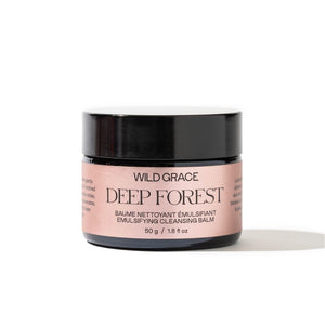 Wild Grace Deep Forest Emulsifying Cleansing Balm in a black jar with a dusty pink label, set against a plain white background.