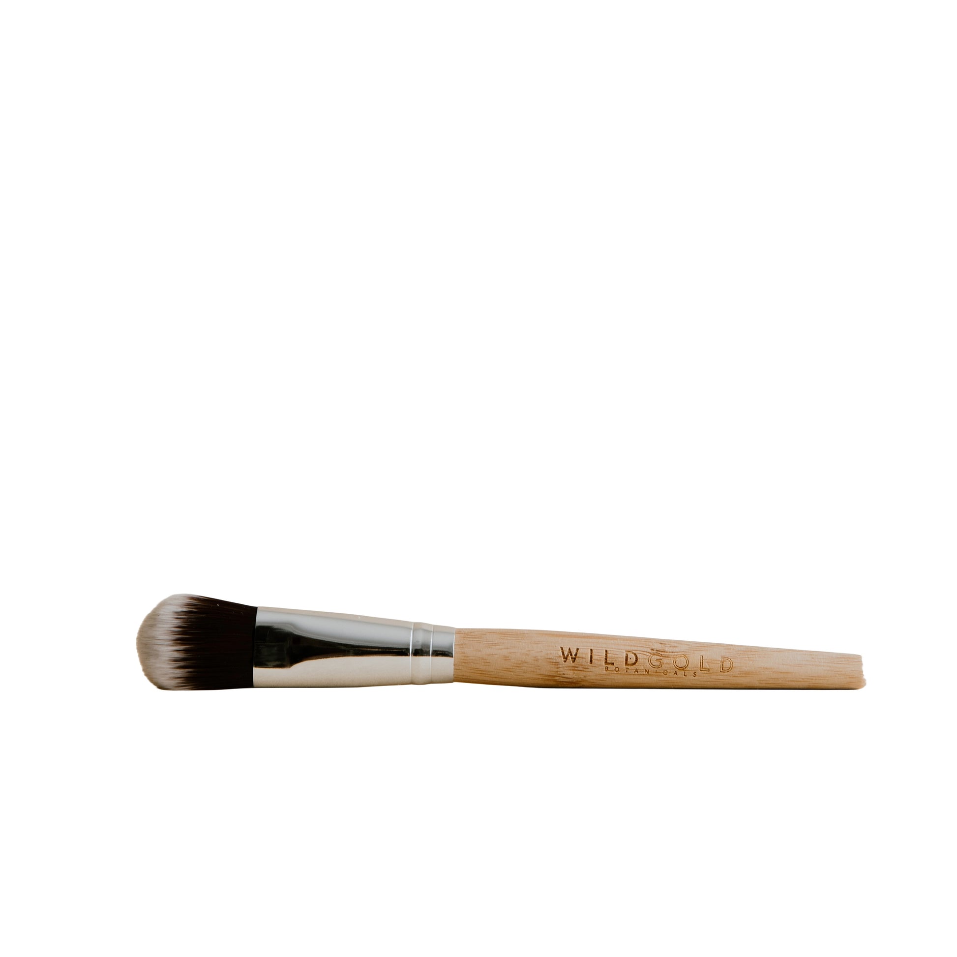 Wildgold Botanicals masque brush with wooden handle and soft vegan bristles for smooth, mess-free application.