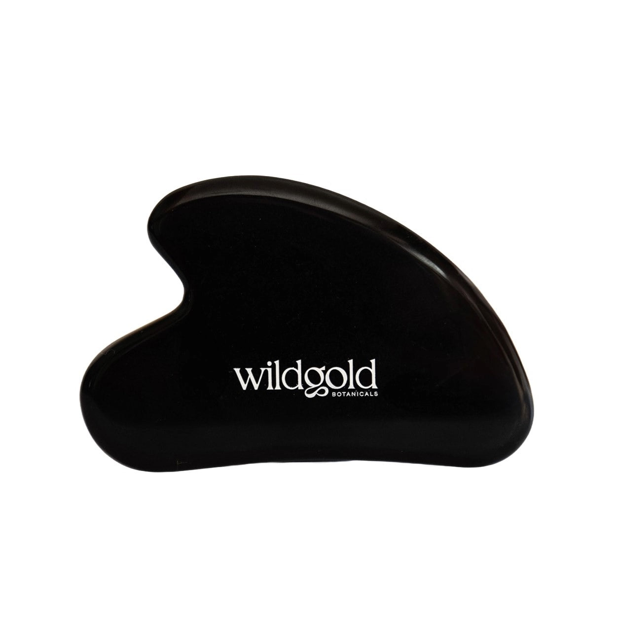 Wildgold Botanicals black obsidian Gua Sha stone, an ancient facial tool used for massaging the face to reduce puffiness, improve appearance, and enhance skin's natural glow.