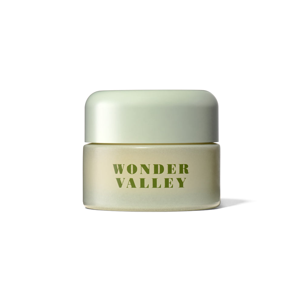 A 30ml jar of Barrier Balm with a pale sage green lid and a matching light beige/cream body, featuring dark green text on a clean white background.
