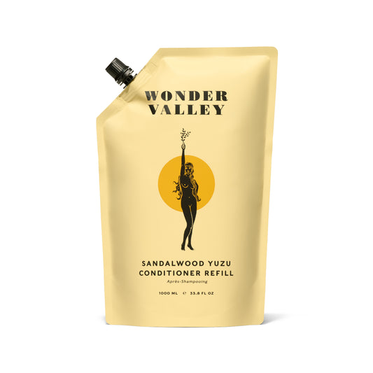 Wonder Valley Sandalwood Yuzu Conditioner Refill pouch with lightweight, hydrating conditioner for soft, shiny hair.