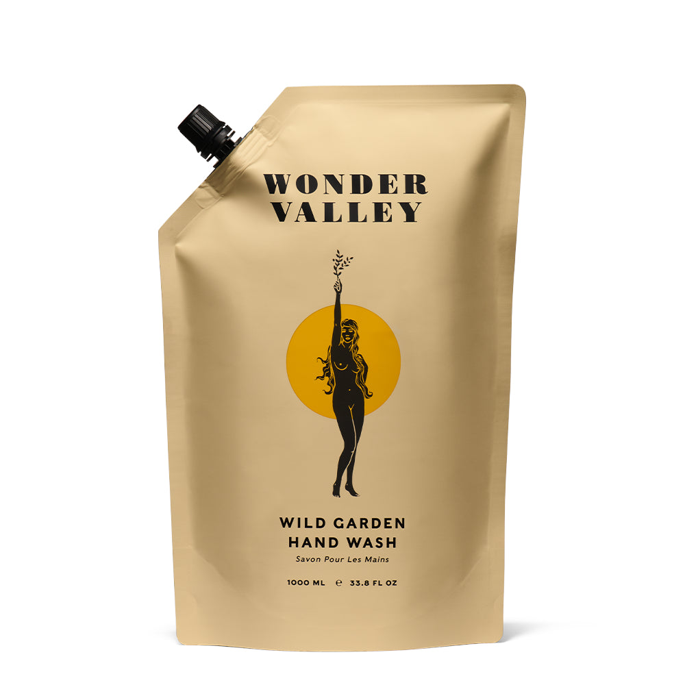 Wonder Valley Wild Garden Hand Wash Refill in 1000ml eco-friendly packaging, infused with olive oil, carrot seed oil, and wild herbal botanicals.
