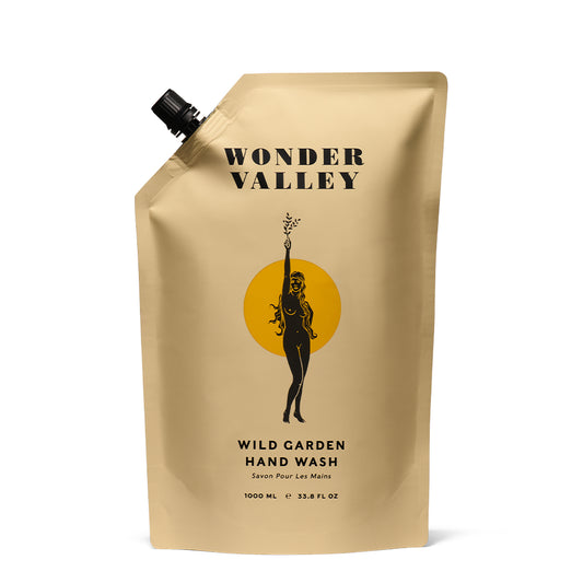 Wonder Valley Wild Garden Hand Wash Refill in 1000ml eco-friendly packaging, infused with olive oil, carrot seed oil, and wild herbal botanicals.