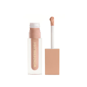Wonderblush makeup product with applicator on a white background