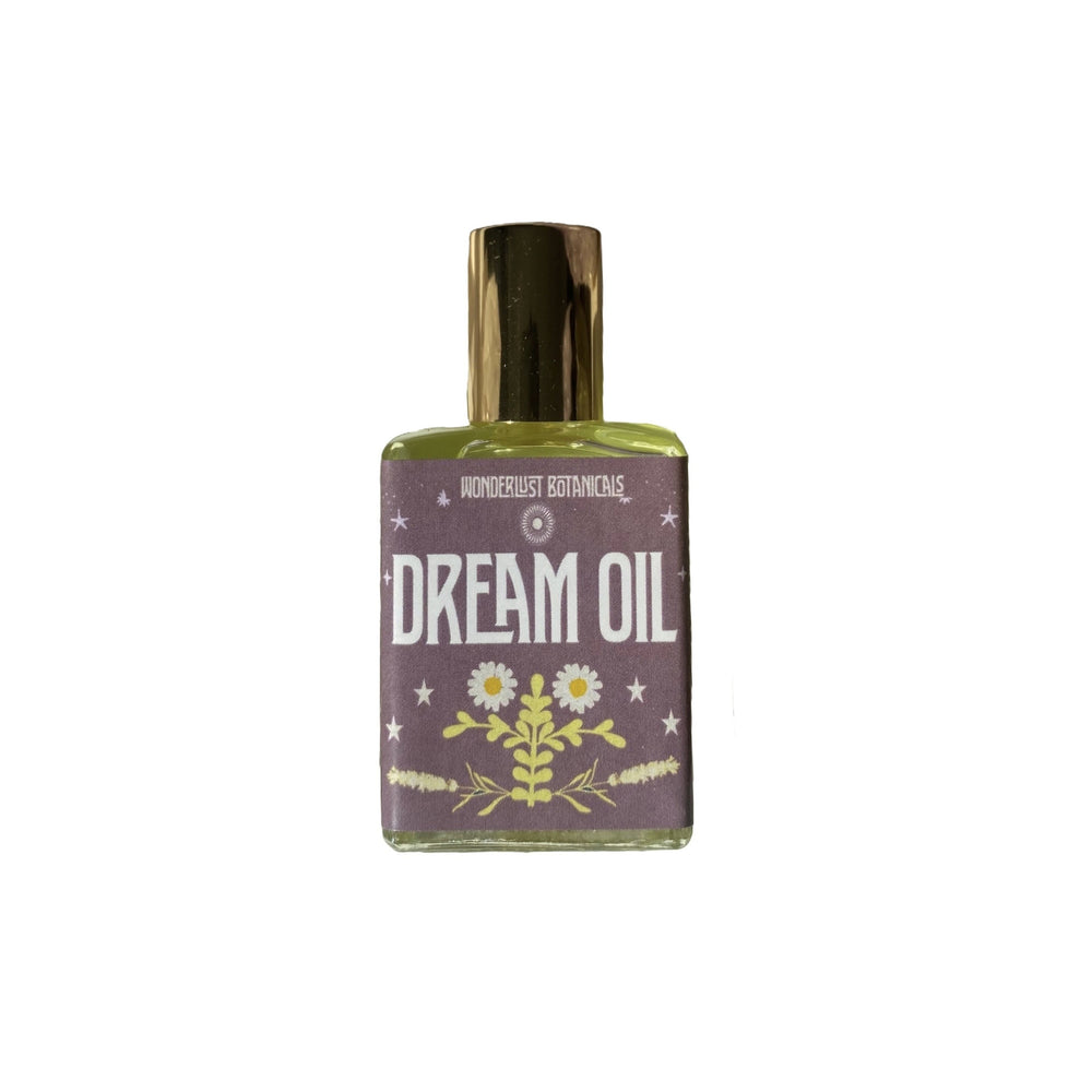 WONDERLUST BOTANICALS Dream Oil in a roll-on or dropper bottle, featuring a calming blend of essential oils for nighttime use.