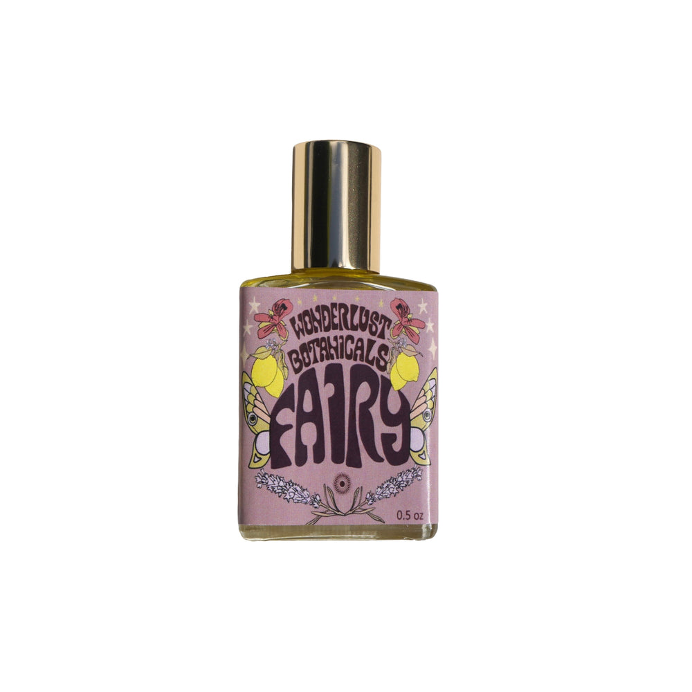 WONDERLUST BOTANICALS Fairy Natural Perfume roll-on bottle with a bright, uplifting lemon and rose scent made from 100% natural essential oils.