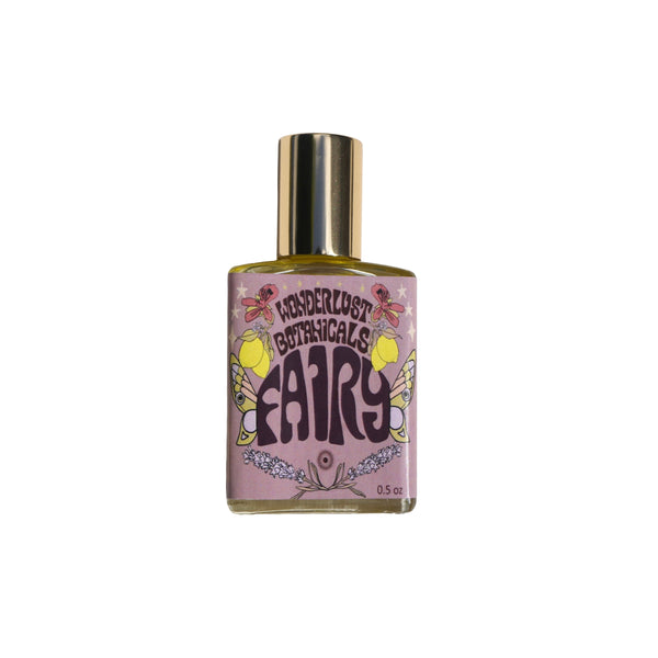 WONDERLUST BOTANICALS Fairy Natural Perfume roll-on bottle with a bright, uplifting lemon and rose scent made from 100% natural essential oils.