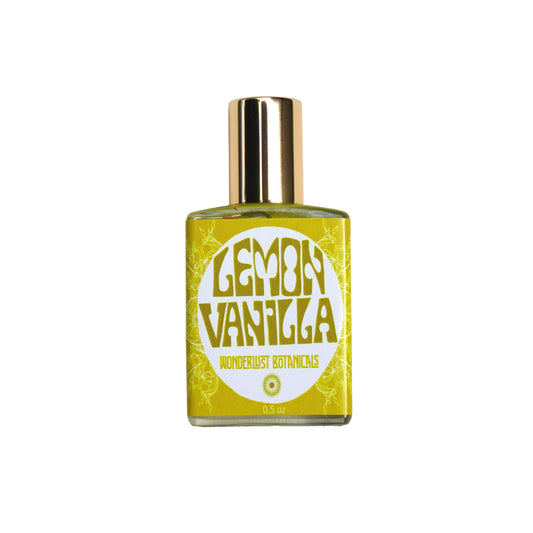 WONDERLUST BOTANICALS Lemon Vanilla natural roll-on perfume in a 0.5 oz glass bottle, featuring a fresh citrus and sweet vanilla blend for an uplifting, summery scent.