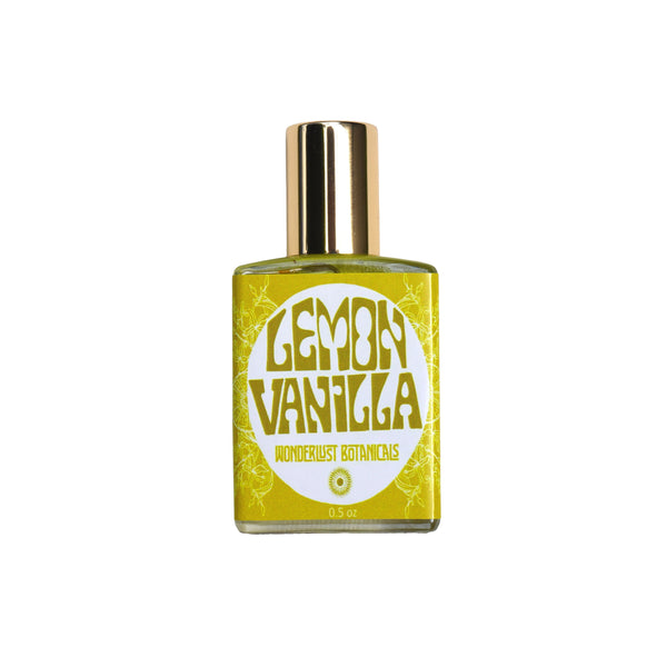WONDERLUST BOTANICALS Lemon Vanilla natural roll-on perfume in a 0.5 oz glass bottle, featuring a fresh citrus and sweet vanilla blend for an uplifting, summery scent.