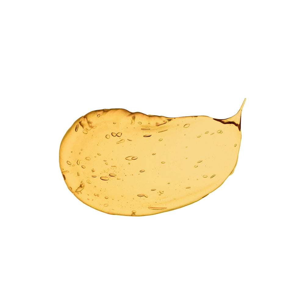 YIN YOUR SKIN IHME Botanical Wonder Essence in violet Miron glass bottle with botanical extracts.