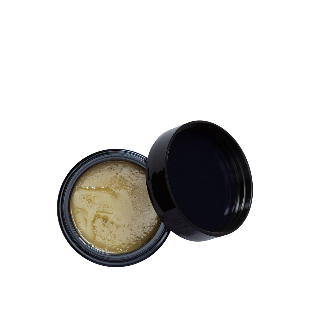 YIN YOUR SKIN SALVA Cleansing Potion in violet glass jar with natural botanical ingredients