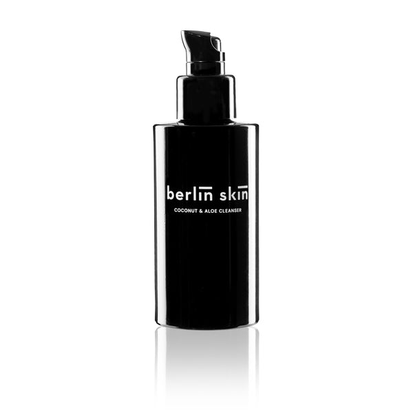 Berlin Skin Coconut & Aloe Cleanser in a recyclable glass bottle with a hydrating, silky formula.