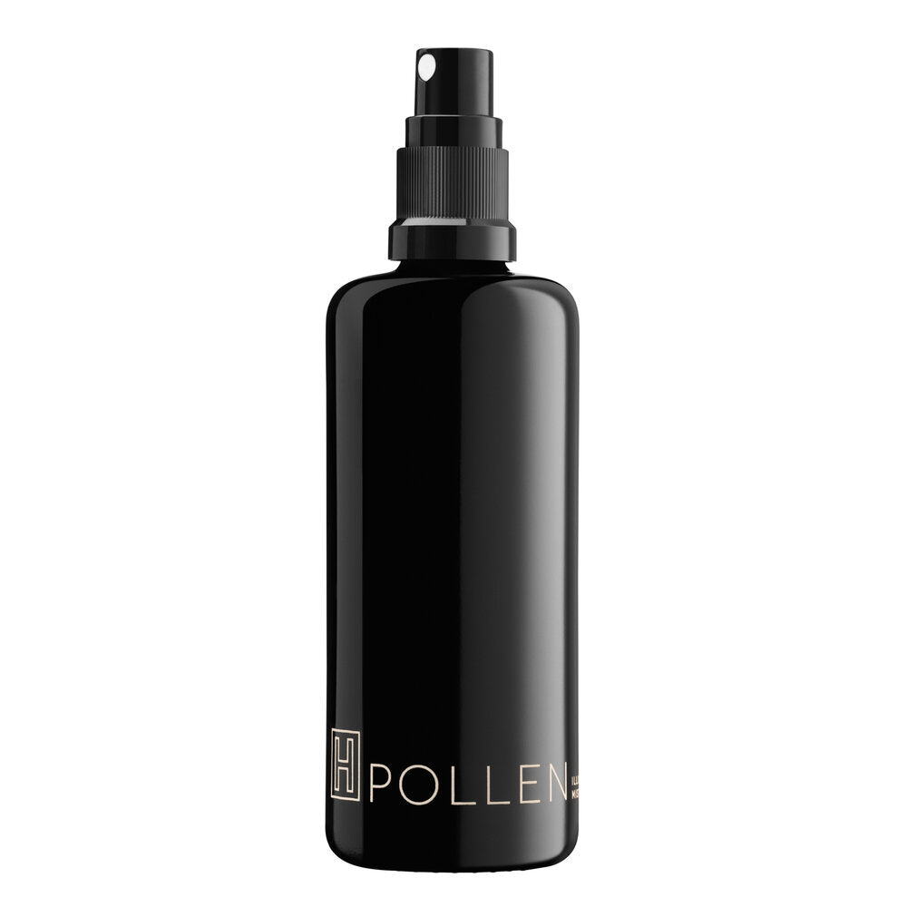 H IS FOR LOVE POLLEN Illuminating Mist bottle with natural ingredients, including rose hydrosol and aloe vera, providing a refreshing skin mist.