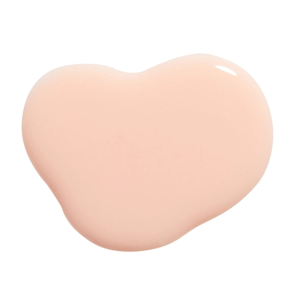 Huella I Do Take You nail lacquer in a sheer nude cream shade, featuring a 15-free, vegan, and chip-resistant formula.