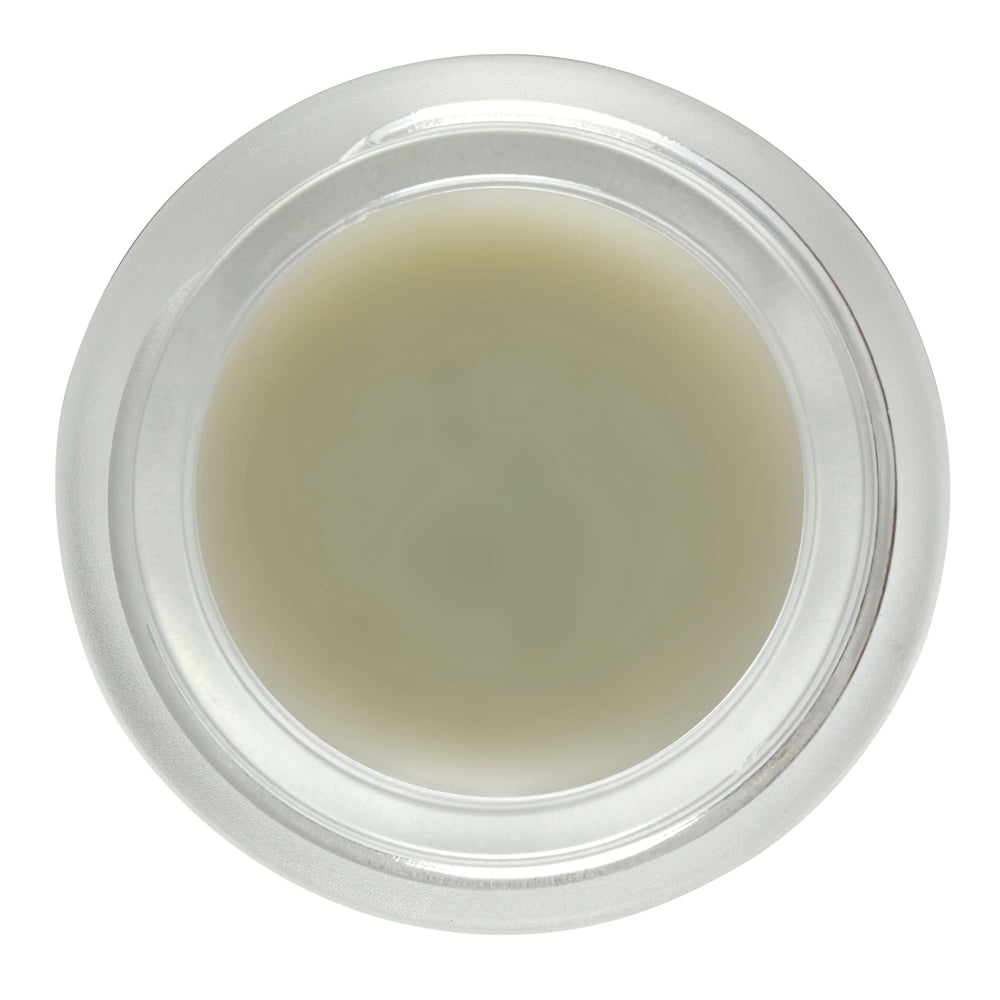 Living Libations DewDab Ozonated Beauty Balm in glass jar.