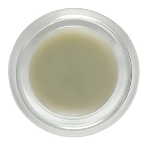 Living Libations DewDab Ozonated Beauty Balm in glass jar.