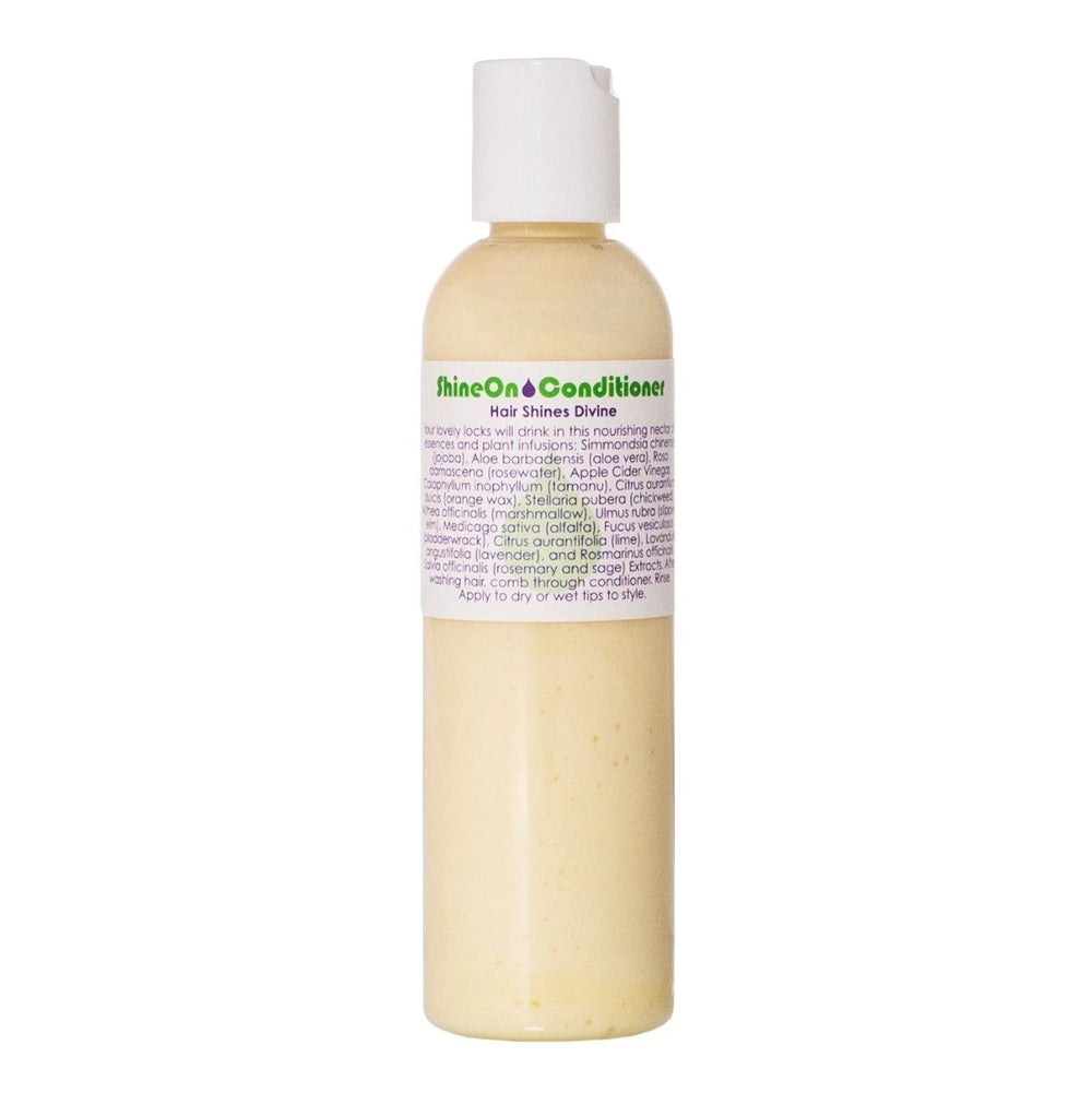 Living Libations Shine On Conditioner bottle, enriched with botanicals for healthy, shiny hair. 240ml