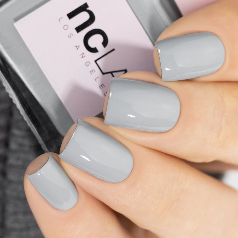 NCLA Do Not Disturb nail lacquer in a chic gray cream shade, 100% vegan and cruelty-free.