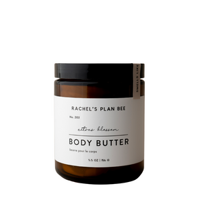 Jar of Rachel’s Plan Bee Citrus Blossom Body Butter with creamy whipped texture on white background.