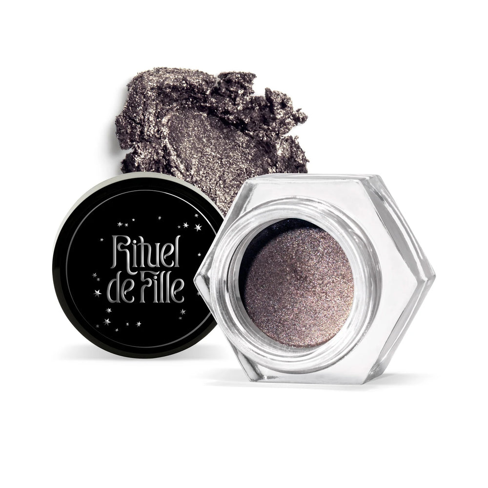 RITUEL DE FILLE Ash and Ember Eye Soot – Cultist, gray-taupe eyeshadow with subtle gold shimmer, light-catching sparks, velvety powder-cream texture in a small jar, vegan.