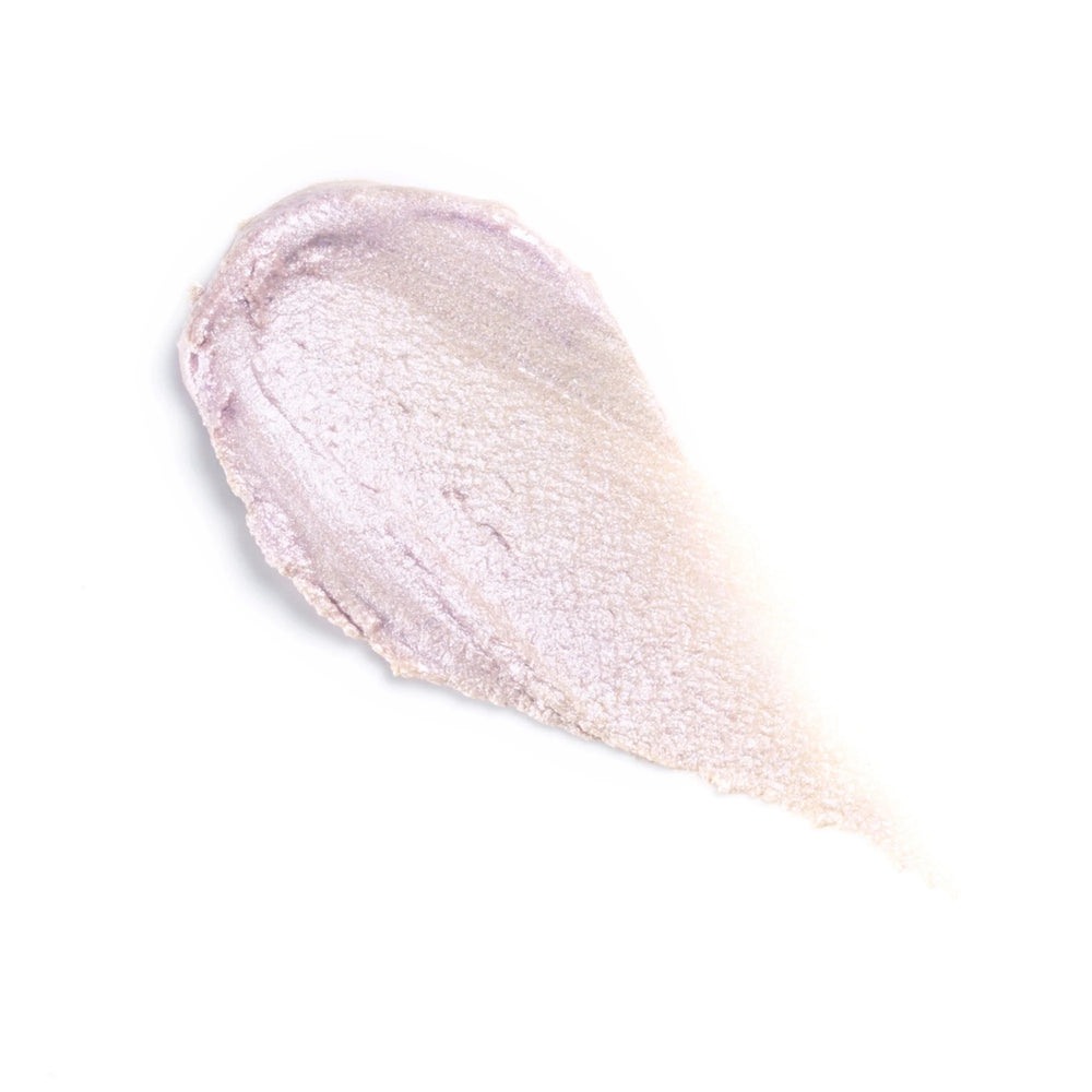 Rituel de Fille Rare Light Crème Luminizer in Ghost Light, cool pale pink with violet-blue shift in compact.