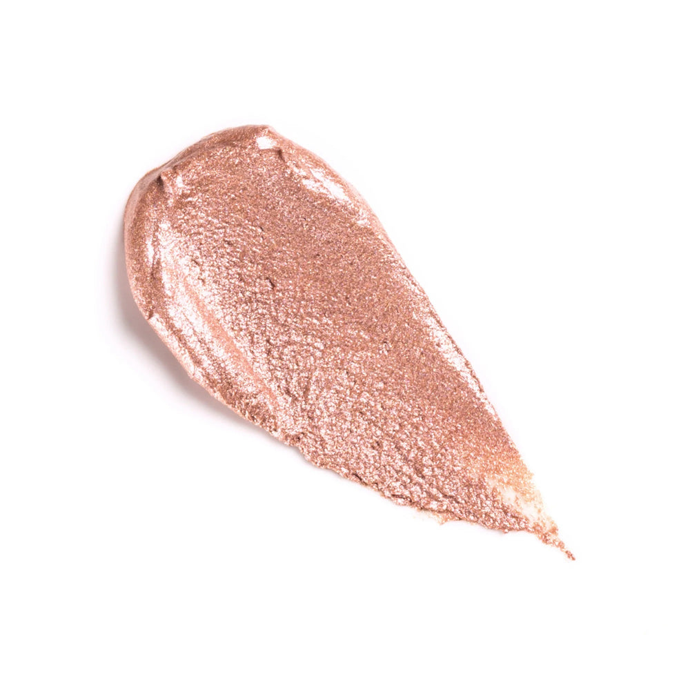 Rituel de Fille Rare Light Crème Luminizer in Phosphene, soft beige glow with peachy-blush shift in compact.